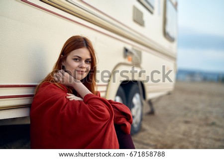 Woman at the van                               