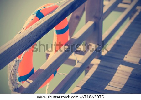 Lifebuoy on a wooden pier
