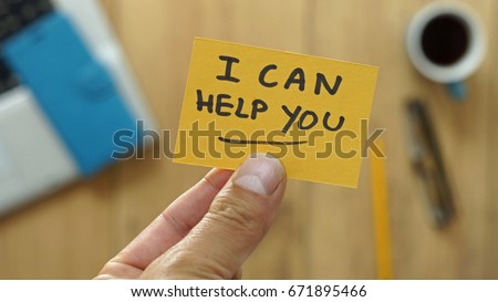 I can help you written on a card at the office                   Royalty-Free Stock Photo #671895466
