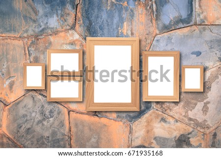 Collage of blank brown wooden frames , interior decor mock up on marble wall, vintage style.