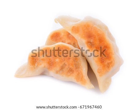Dumplings isolated on white background. Royalty-Free Stock Photo #671967460