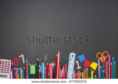 Education school tools,studies accessories on Black Chalkboard  Background