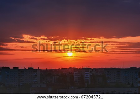Sunrise and sky with clouds over morning city.