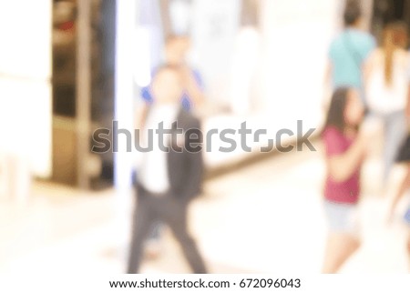 Blurred people walking