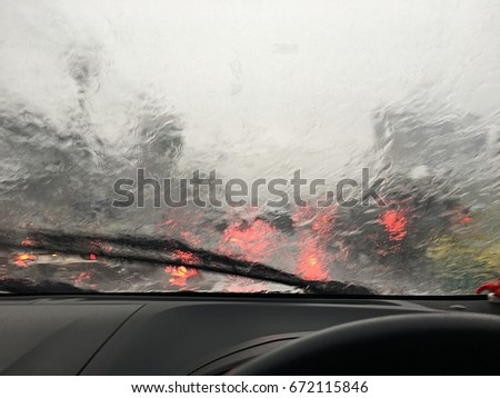 Rainy in front of a windshield