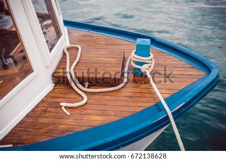 Mooring rope and tower on a boat. Conceptual vision for this picture: What limits you. Barriers and obstacles to success. 