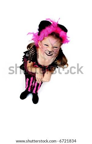 Child dressed up in cat costume for Halloween
