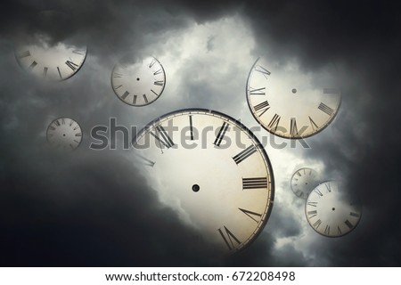 Vintage clocks floating away in the cloudy sky.Free time / Freedom concept.