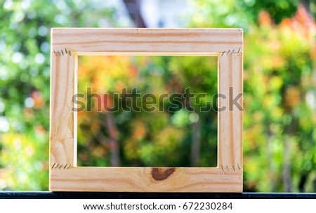  Picture frame on blurred tree background using wallpaper or background for idea work.