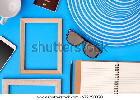 Wooden picture frame and set object vacation relax on colorful paper with travel and fashion style