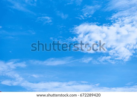 White Clouds in Blue Sky                            