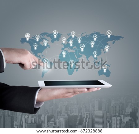 Business man concept using digital tablet and icon world network connection