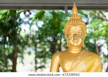 Golden Buddha in temple , Thailand
