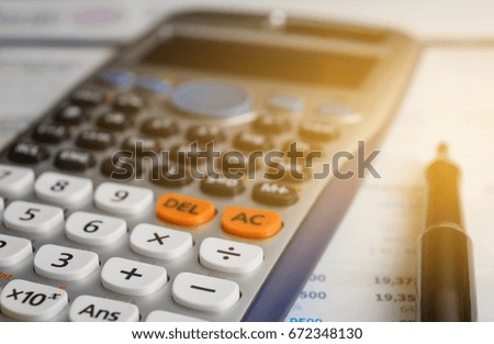 close up advance calculator for engineer or business on the finance paper.