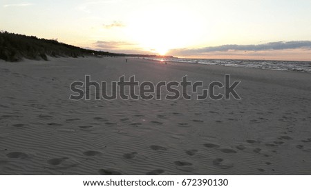 sunset beach with foots