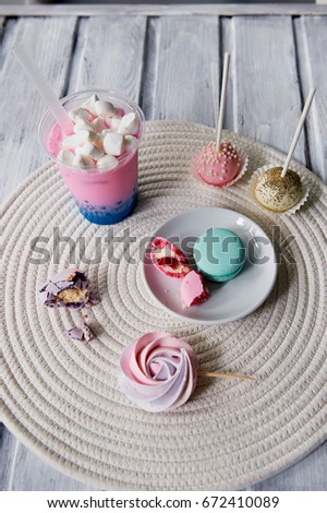 Beautiful sweets pastel shades on a beautiful wooden background. Aesthetic picture. dining, cooking, for children's parties