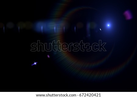 Lens flare effect isolated on black background for overlay design photo 