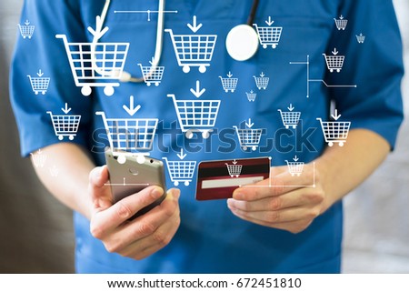 Doctor pressing modern technology panel shopping cart web phone credit card