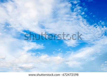 Blue and white cloudy sky background