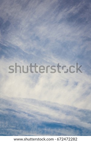 Blue cloudy sky background at sunset