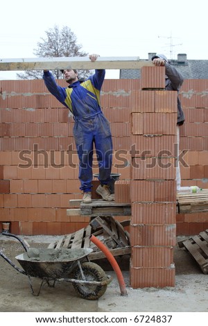master bricklayer building-up one family house