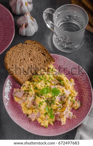 Scrambled eggs, wholegrain bread with fresh microgreens on top