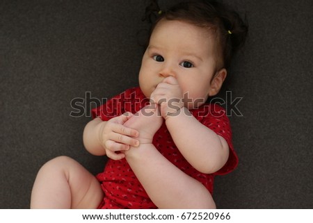 Little Cute Baby 6 six months eat her foot