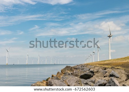 Windmolen park, TRANSLATION: Offshore Windmill farm Westermeerwind park,Windmill park Westermeerwind the largest wind farm offshore in the Netherlands.