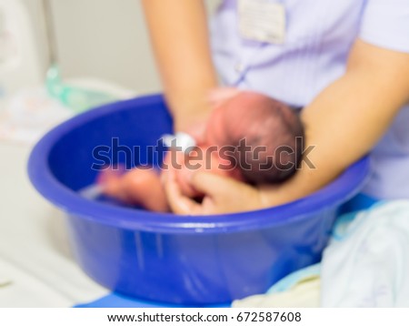 Blurred images of Nursing baby bath in the hospital.
