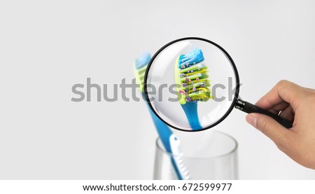Bacteria in a toothbrush Royalty-Free Stock Photo #672599977
