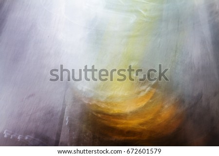 abstract photo of light burst among bottle. blurred and filtered