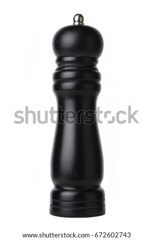 black pepper wood bottle isolated on white background. Royalty-Free Stock Photo #672602743