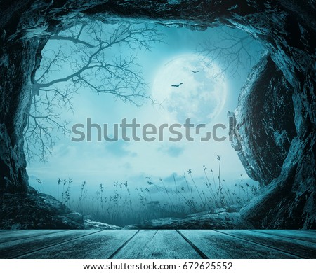 Halloween concept: Wooden table with empty tomb stone at spooky night background - 3D illustration Royalty-Free Stock Photo #672625552