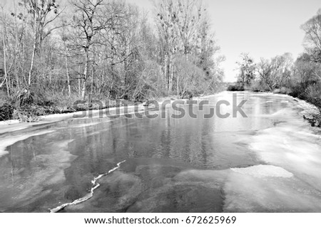 Old Rhine in Lichtenau-Grauelsbaum in winter Germany black and white