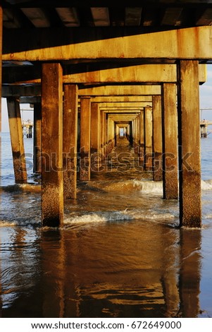 Docks in the sea, Frames and structures in wood sunset at the beach