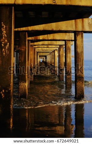 Docks in the sea, Frames and structures in wood sunset at the beach