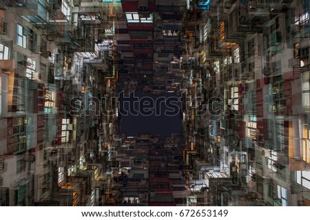 Traditional Hong Kong apartment building under double exposure