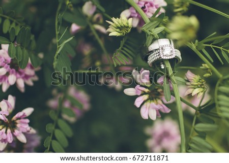 Wedding Rings with Purple Flowers