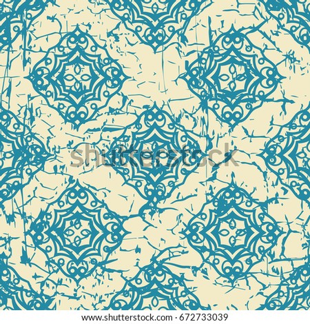 Ornamental seamless pattern with grunge scratched faded effect. Template for design.