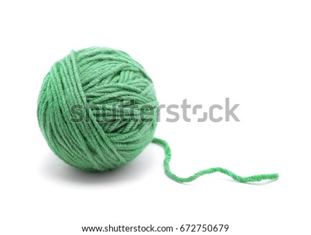 Ball of yarn on white background Royalty-Free Stock Photo #672750679