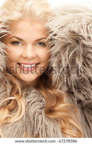 bright picture of beautiful woman in fur