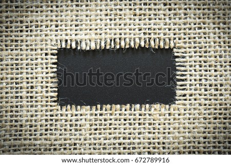 black paper has Cotton yarn background you can apply to your product.