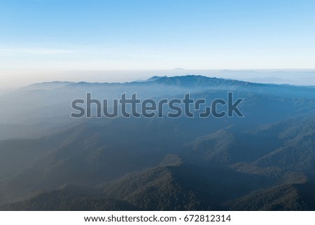 beautiful high mountain landscape in foggy morning at sunrise ,Thailand.