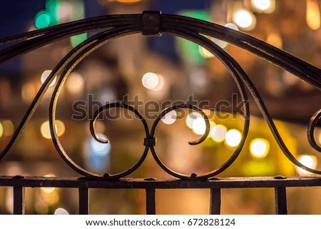 fence in blurred lights 