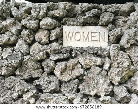 Women's bathroom sign Volcanic rock in Maui
