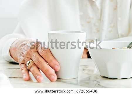 part of senior woman with breakfast, Senior healthy eating
