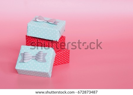 Gift boxes over pink background color,copy space 