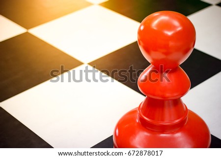 Red Pawn on Chessboard, Winning and Success Concept