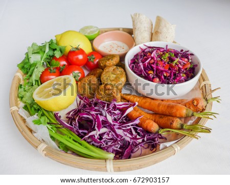 Homemade middle eastern cuisine of high dietary fiber / Falafel Vegetarian Platter / Light and delicious healthy vegetarian meal to boost your intake of vitamin and mineral enriched supply