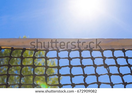 Tennis net on blue sky
